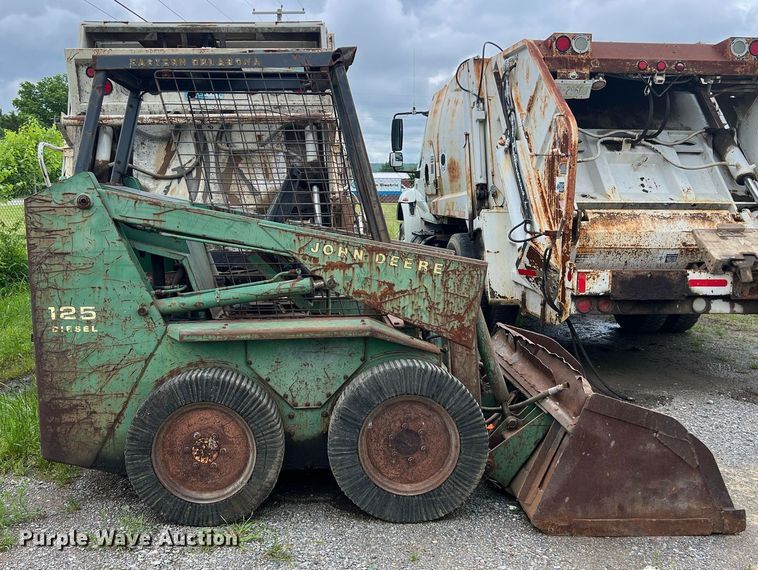 image for item EL2076 John Deere L125J skid steer loader