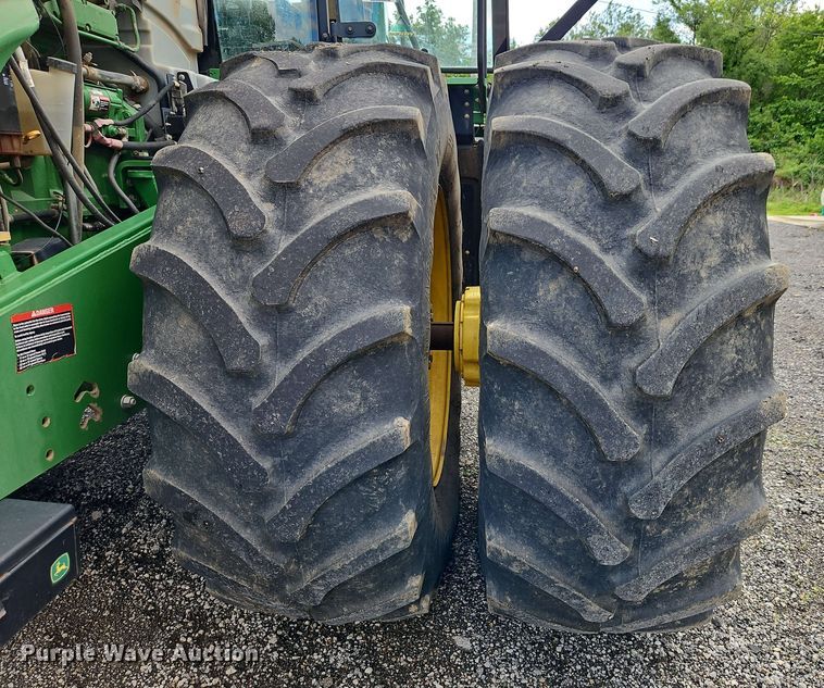 image for item EJ0030 2003 John Deere 9430 4WD tractor