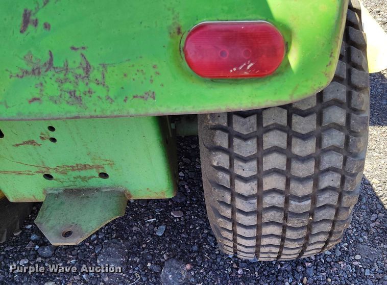 image for item IP9579 John Deere 110 lawn mower