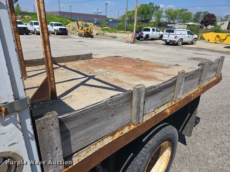 image for item EC4224 2002 Freightliner FL60 flatbed truck