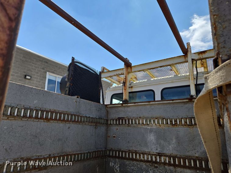 image for item EC4224 2002 Freightliner FL60 flatbed truck