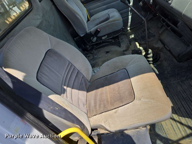 image for item EC4224 2002 Freightliner FL60 flatbed truck