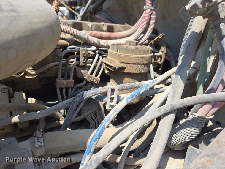 image for item EC4224 2002 Freightliner FL60 flatbed truck