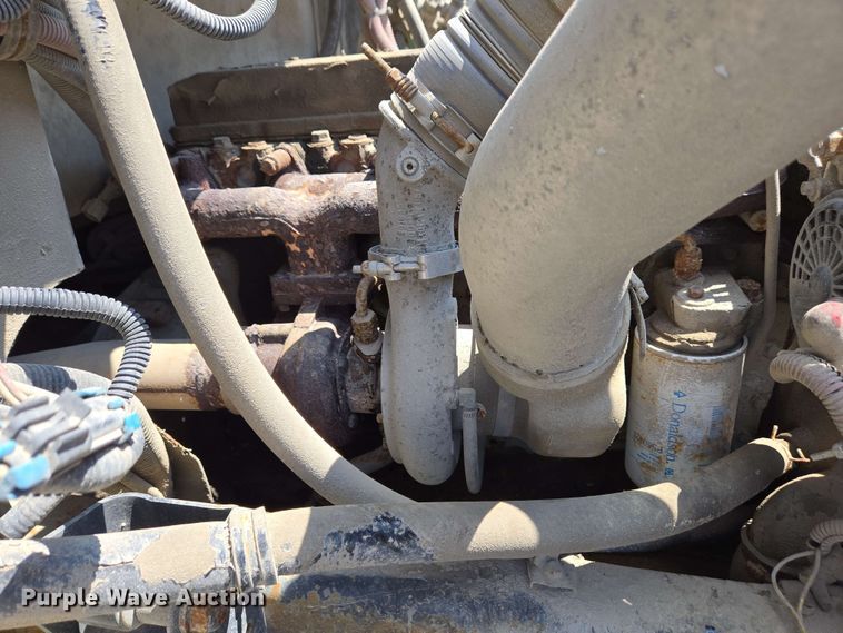 image for item EC4224 2002 Freightliner FL60 flatbed truck