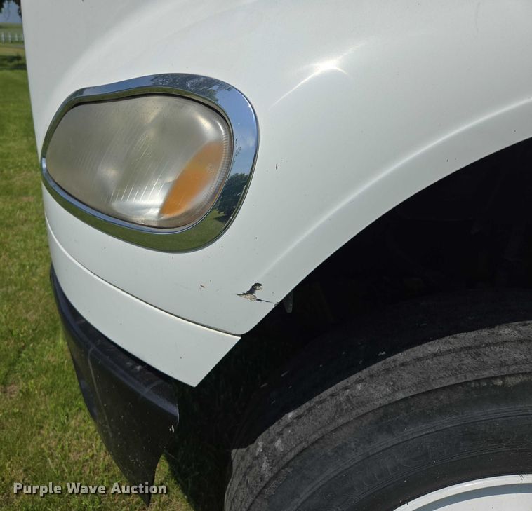 image for item EM7327 2010 Freightliner Business Class M2 semi truck