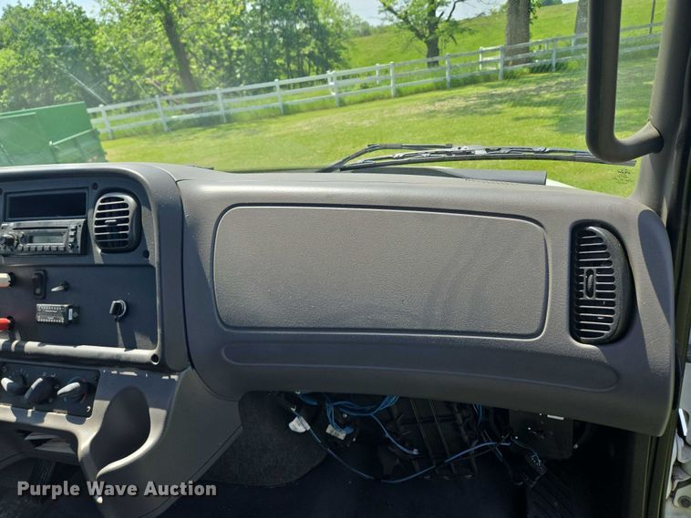 image for item EM7327 2010 Freightliner Business Class M2 semi truck