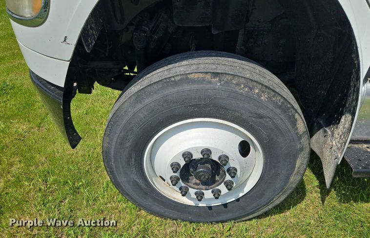 image for item EM7327 2010 Freightliner Business Class M2 semi truck