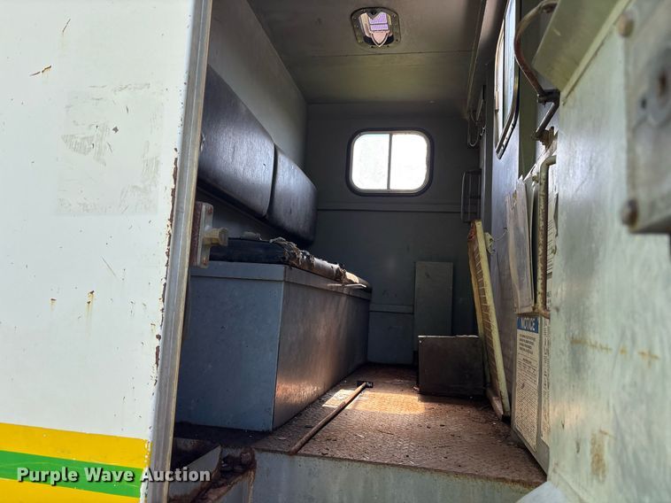 image for item ND9763 2009 GMC C6500 chipper truck