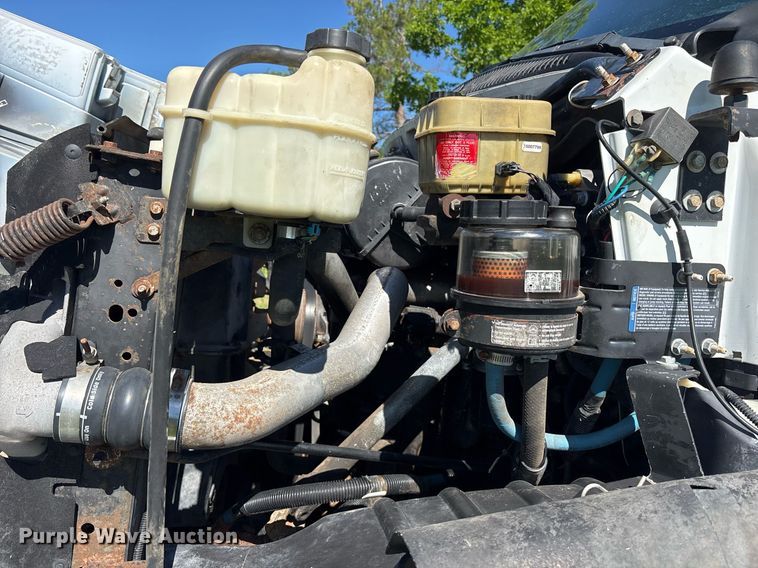 image for item ND9763 2009 GMC C6500 chipper truck