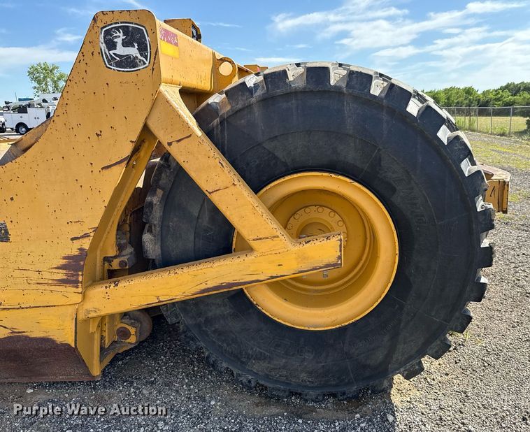 image for item EE0034 2012 John Deere 2112E scraper