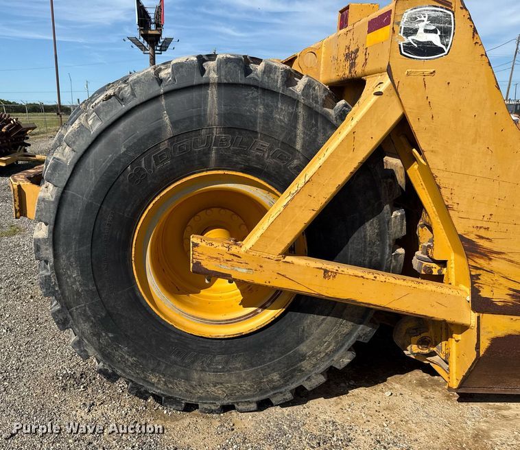 image for item EE0034 2012 John Deere 2112E scraper