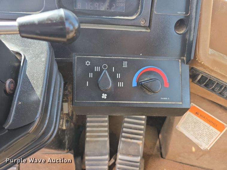 image for item EE0046 2001 Caterpillar 815F soil compactor