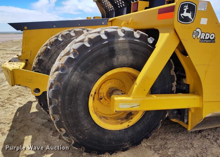 image for item EH0256 2018 John Deere 2010E scraper