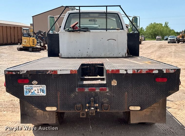 image for item DU9740 1992 GMC C7 flatbed truck