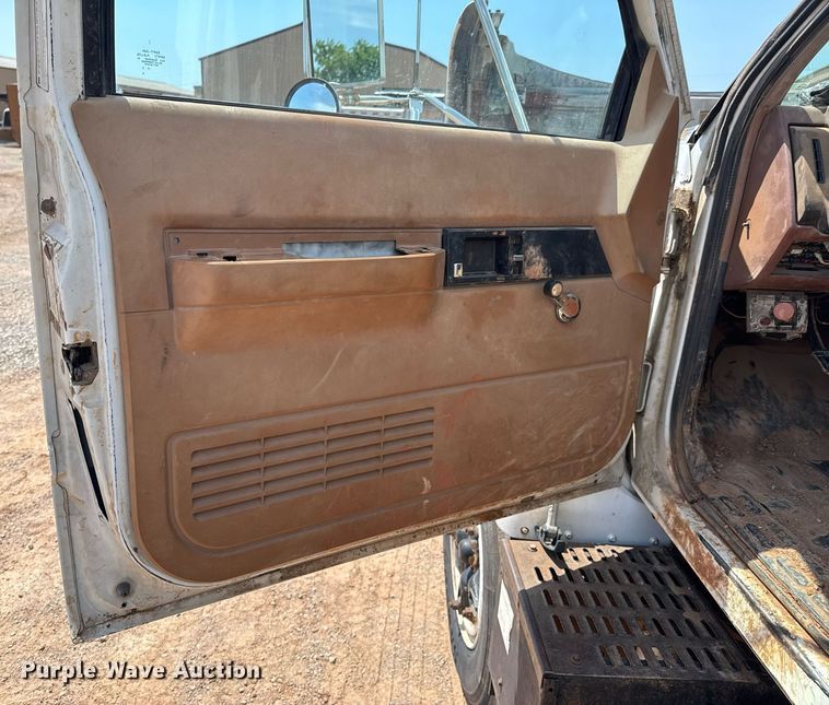 image for item DU9740 1992 GMC C7 flatbed truck