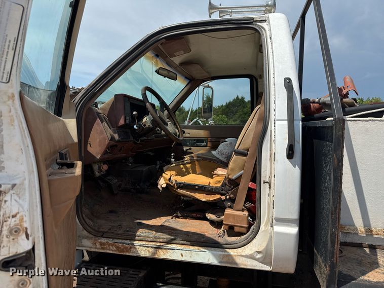 image for item DU9740 1992 GMC C7 flatbed truck