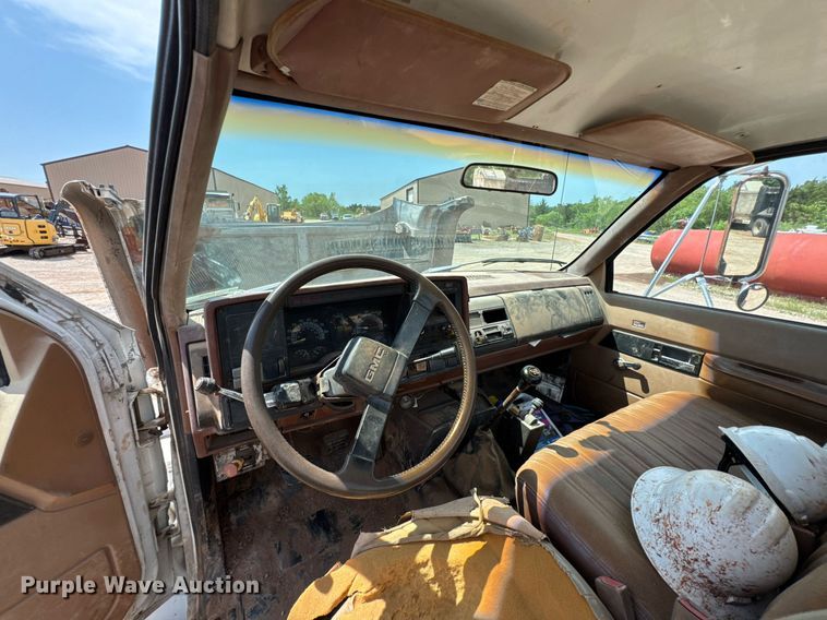 image for item DU9740 1992 GMC C7 flatbed truck