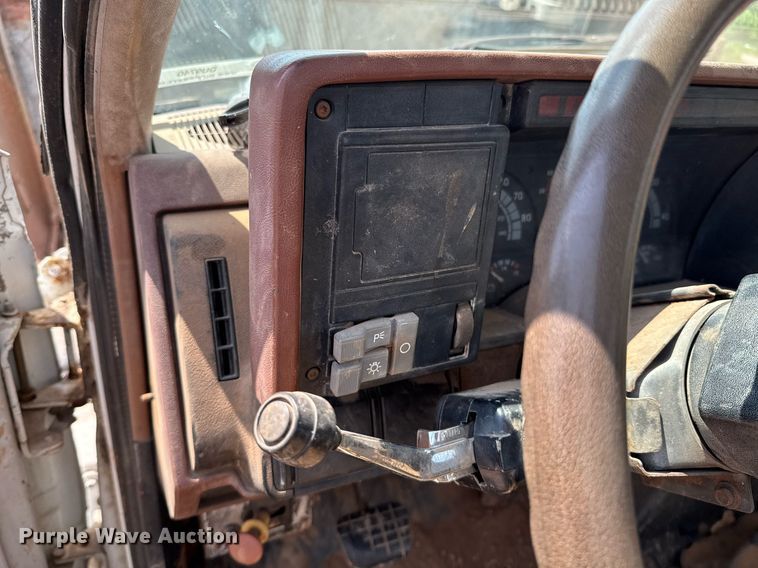 image for item DU9740 1992 GMC C7 flatbed truck