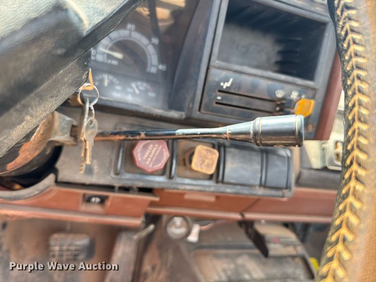 image for item DU9740 1992 GMC C7 flatbed truck