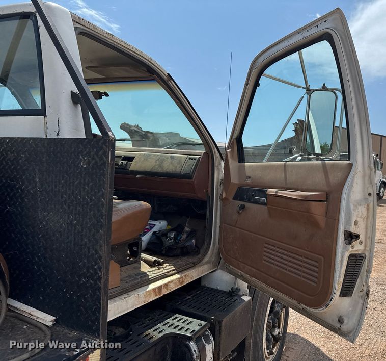 image for item DU9740 1992 GMC C7 flatbed truck