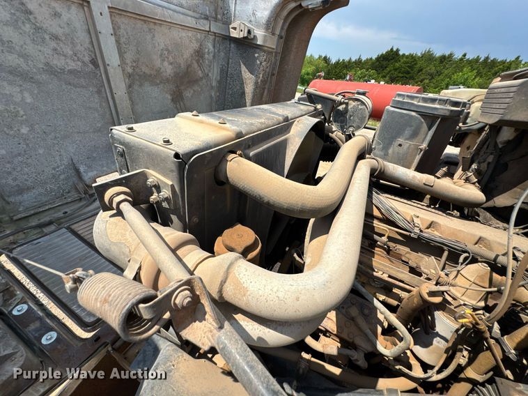 image for item DU9740 1992 GMC C7 flatbed truck