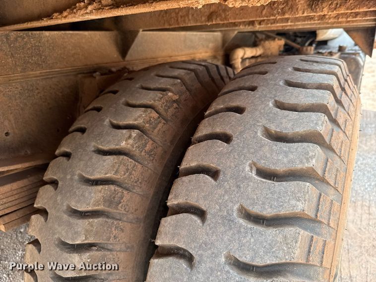 image for item DU9740 1992 GMC C7 flatbed truck