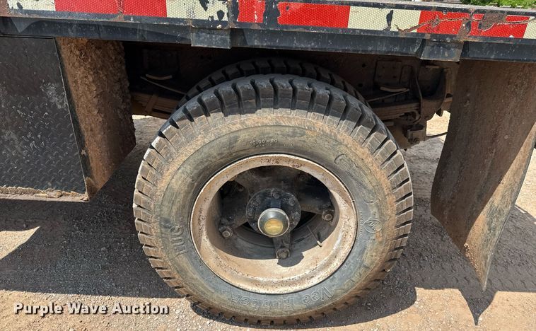 image for item DU9740 1992 GMC C7 flatbed truck