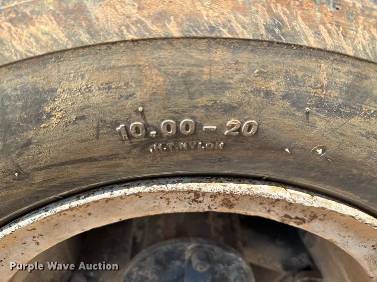 image for item DU9740 1992 GMC C7 flatbed truck