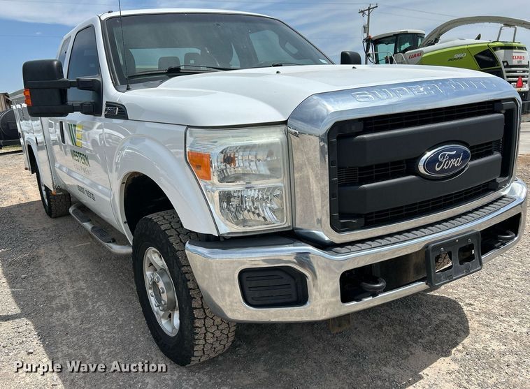 image for item DW8001 2015 Ford F250 Super Duty SuperCab utility bed pickup truck