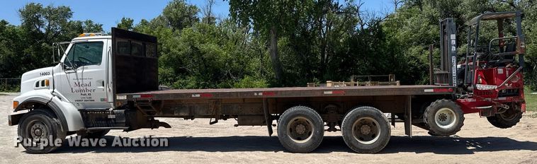image for item DY0002 2002 Sterling LT9500 flatbed truck