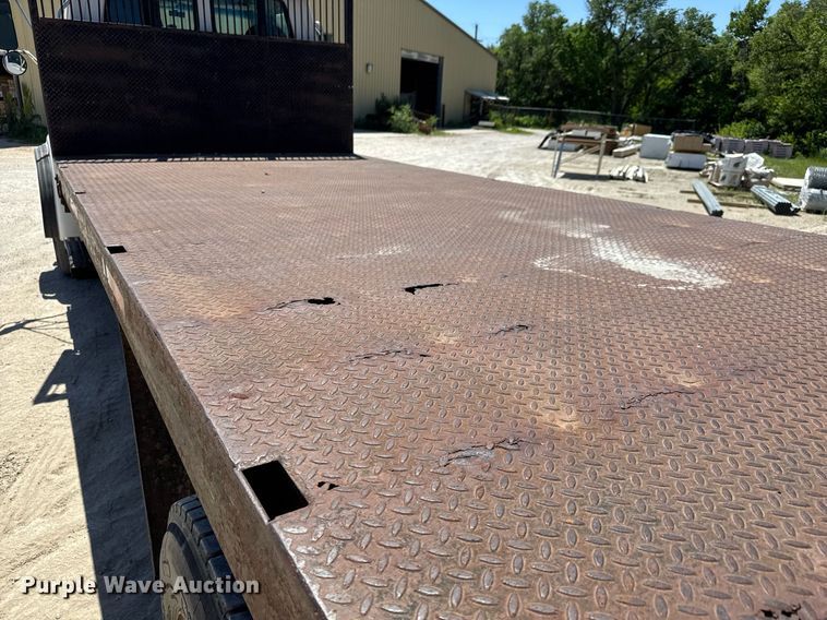 image for item DY0002 2002 Sterling LT9500 flatbed truck