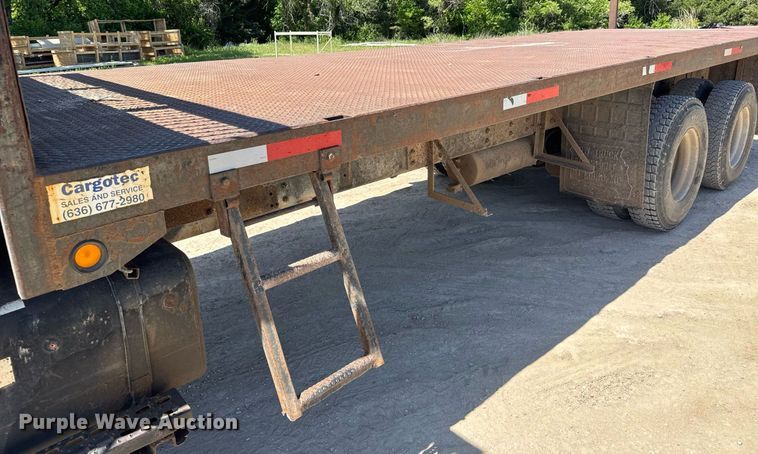 image for item DY0002 2002 Sterling LT9500 flatbed truck