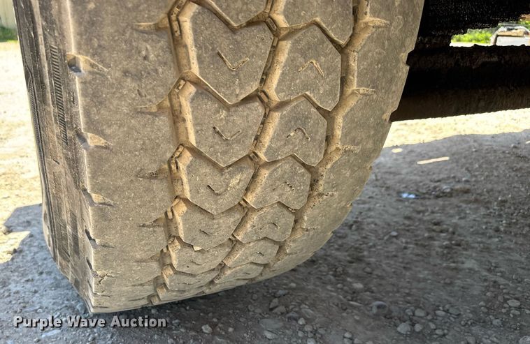 image for item DY0002 2002 Sterling LT9500 flatbed truck