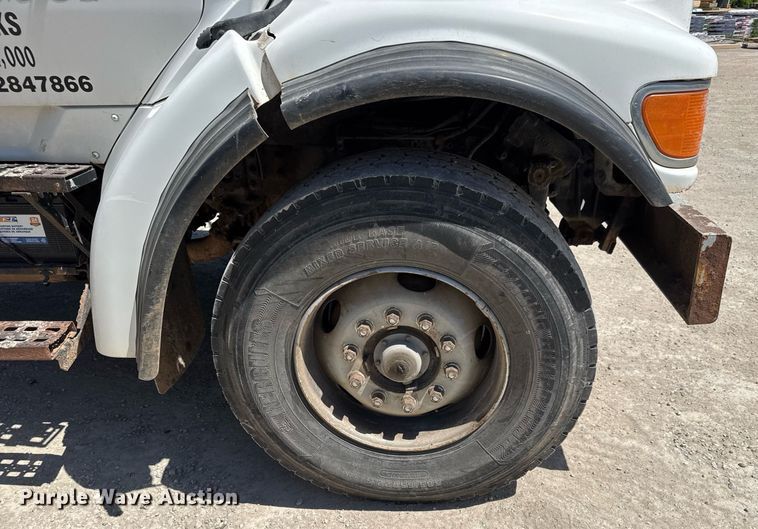 image for item DY0002 2002 Sterling LT9500 flatbed truck