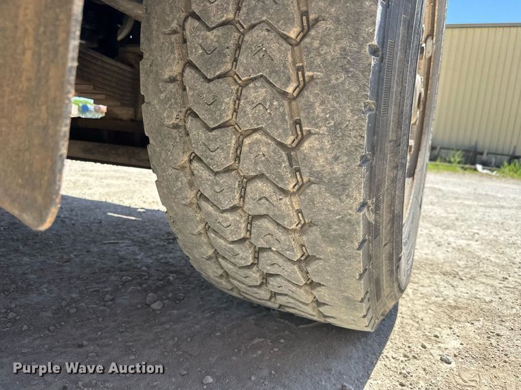 image for item DY0002 2002 Sterling LT9500 flatbed truck