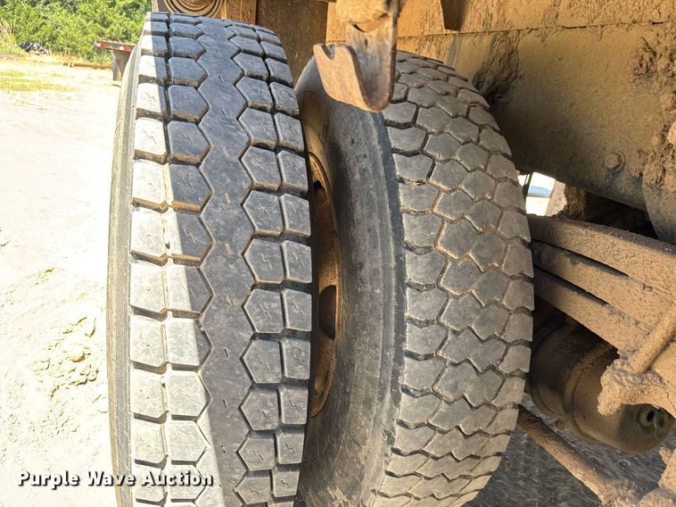 image for item DY0002 2002 Sterling LT9500 flatbed truck