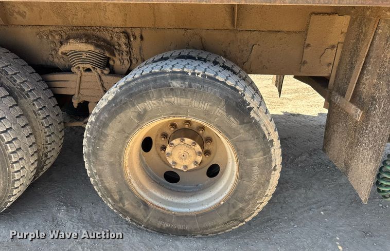 image for item DY0002 2002 Sterling LT9500 flatbed truck