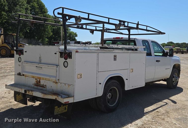 image for item ED2003 2009 GMC Sierra 3500HD Ext. Cab utility bed pickup truck