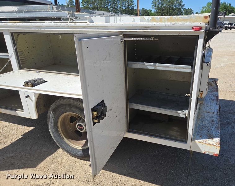 image for item ED2003 2009 GMC Sierra 3500HD Ext. Cab utility bed pickup truck