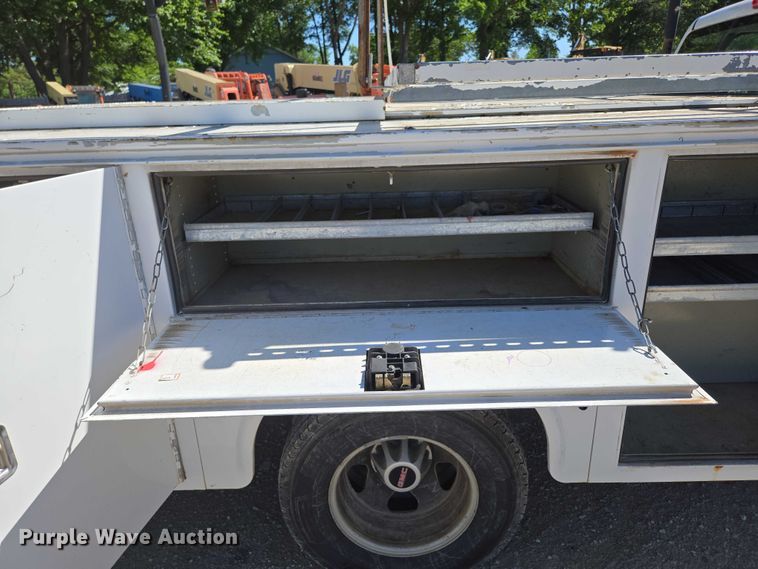 image for item ED2003 2009 GMC Sierra 3500HD Ext. Cab utility bed pickup truck