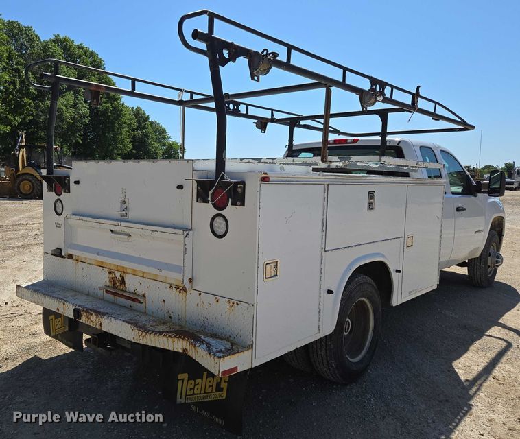 image for item ED2003 2009 GMC Sierra 3500HD Ext. Cab utility bed pickup truck