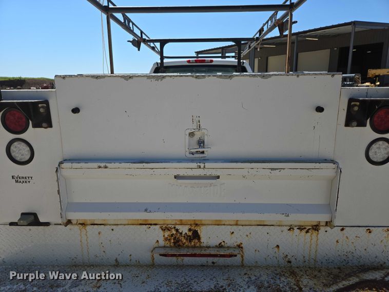 image for item ED2003 2009 GMC Sierra 3500HD Ext. Cab utility bed pickup truck