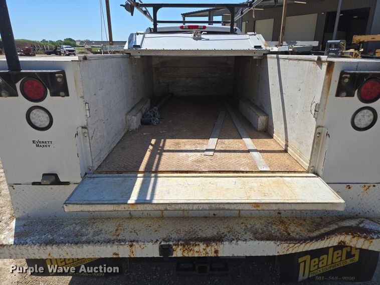 image for item ED2003 2009 GMC Sierra 3500HD Ext. Cab utility bed pickup truck