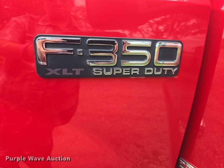 image for item EF3530 2004 Ford F350 Super Duty XLT Crew Cab flatbed pickup truck