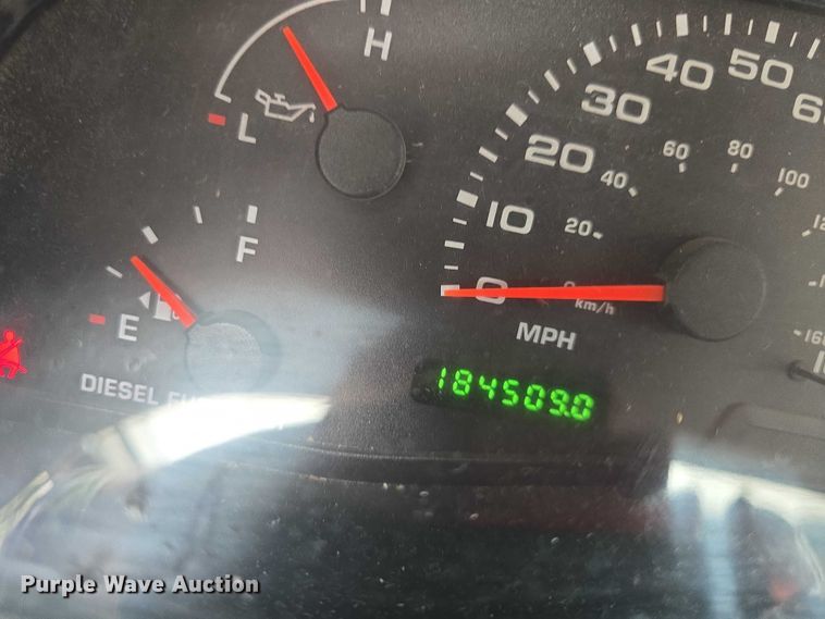 image for item EF3530 2004 Ford F350 Super Duty XLT Crew Cab flatbed pickup truck