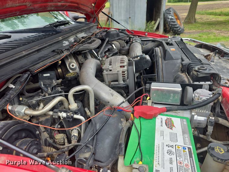 image for item EF3530 2004 Ford F350 Super Duty XLT Crew Cab flatbed pickup truck