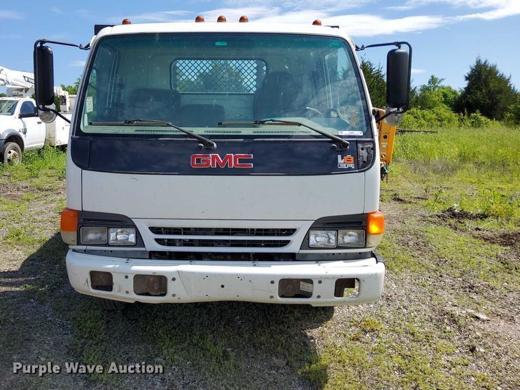 image for item EJ0061 2003 GMC W4 dump flatbed truck