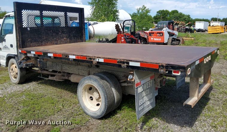 image for item EJ0061 2003 GMC W4 dump flatbed truck