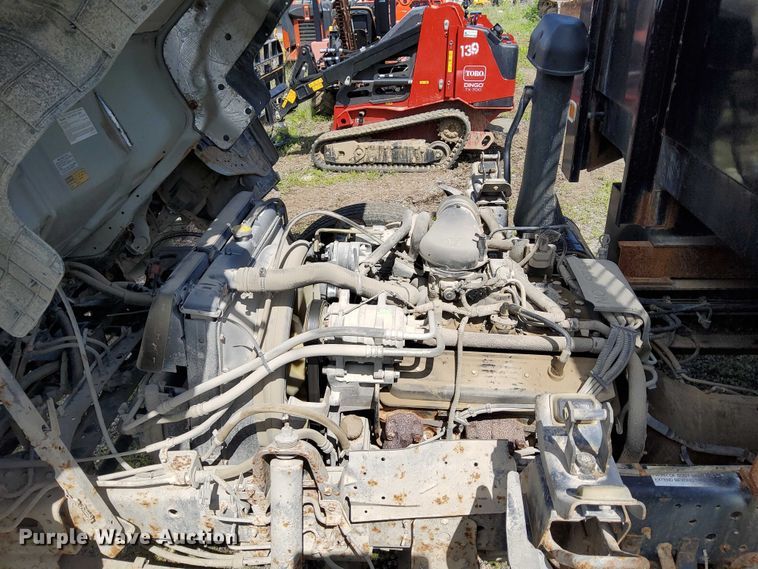 image for item EJ0061 2003 GMC W4 dump flatbed truck