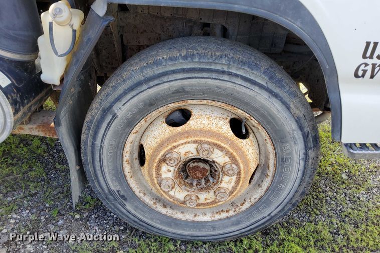 image for item EJ0061 2003 GMC W4 dump flatbed truck